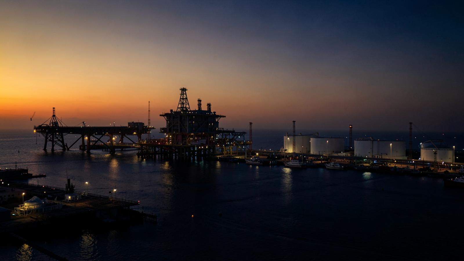Ghana's oil and gas hub at dusk — Touchstone, PHDC and Rig World set out a phased path from vision to deliverable deal.